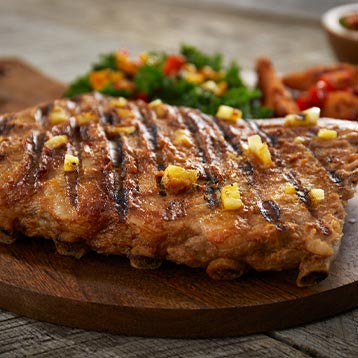 grilled pineapple and Sriracha St. Louis style ribs