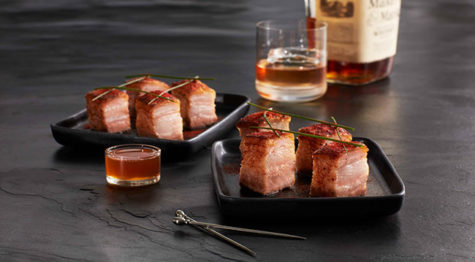 crispy pork belly with smoked paprika and honey whiskey drizzle